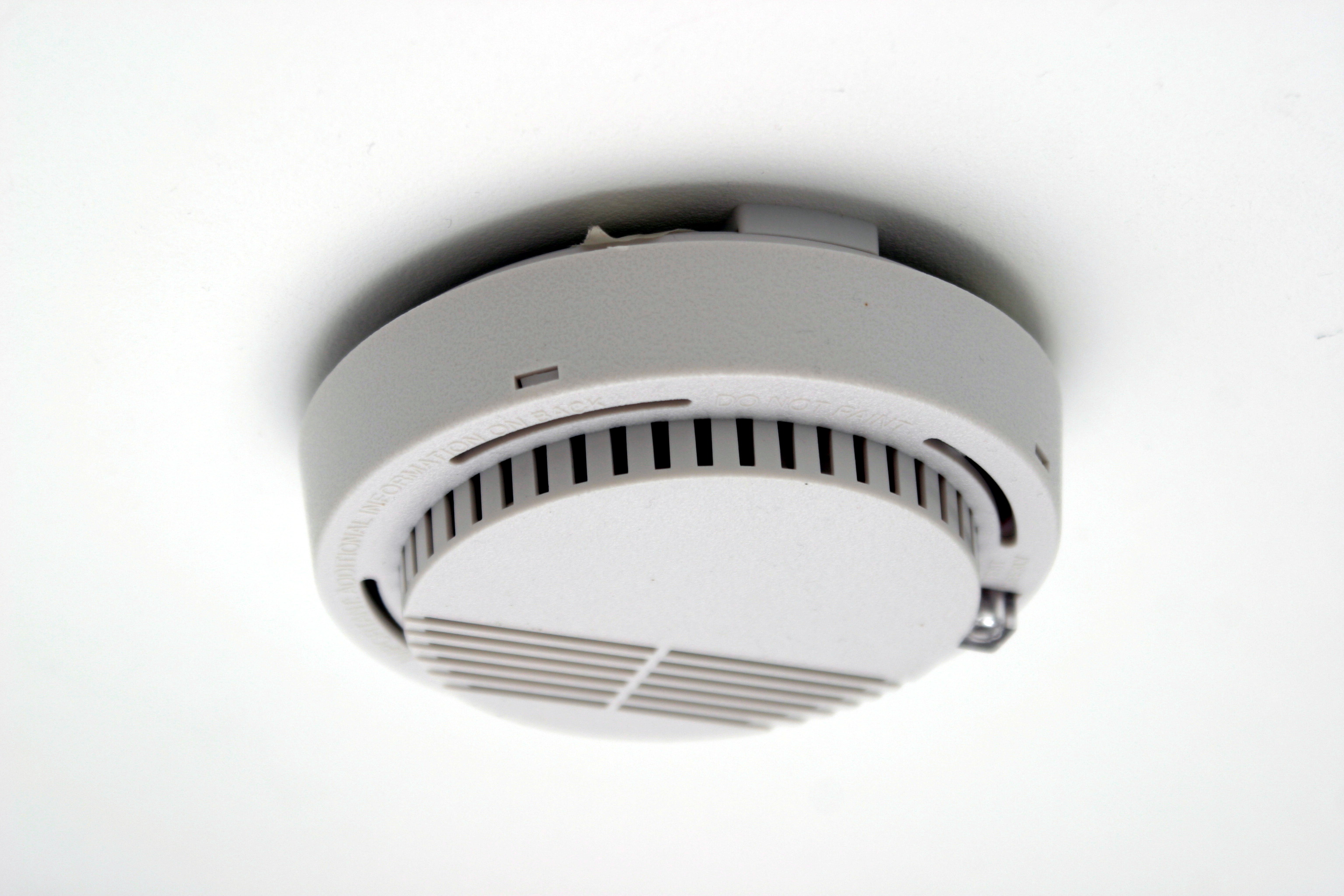 What is the difference between ASD (Aspirating Smoke Detection) and Spot-type smoke detectors in Data Centers?